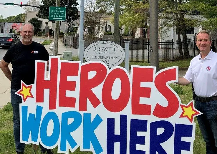 'Heroes Work Here' signs placed outside metro Atlanta Healthcare facilities, police and fire departments