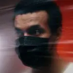 Man wearing a black face mask