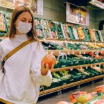Woman wearing mask in supermarket