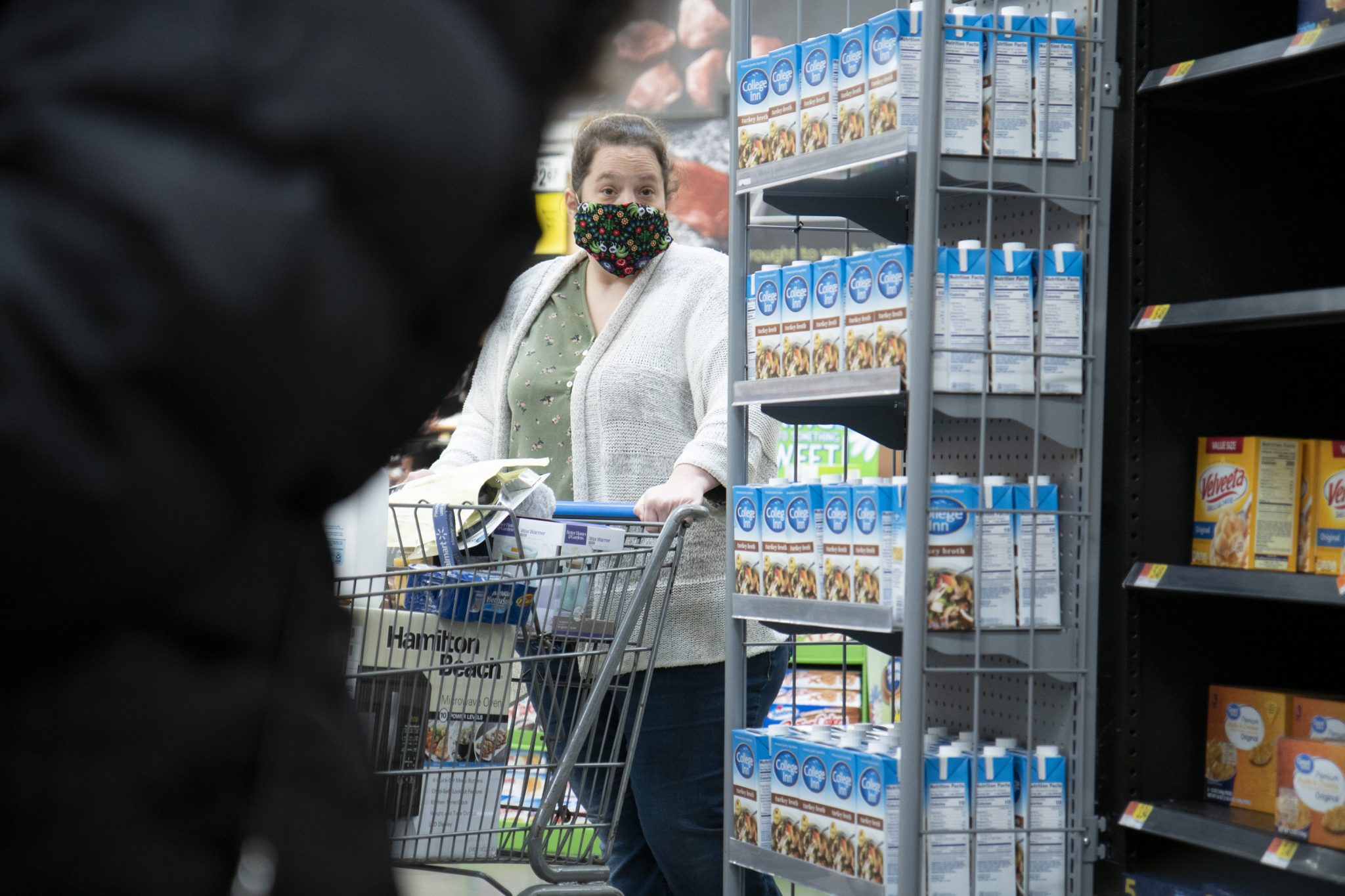 Illinois, United States, - April 10th 2020: A Walmart customer ina  face mask attempting to get groceries during the pandemic.