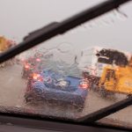 POV Windshield Wipers Displacing Heavy Rain In Rush Hour Traffic