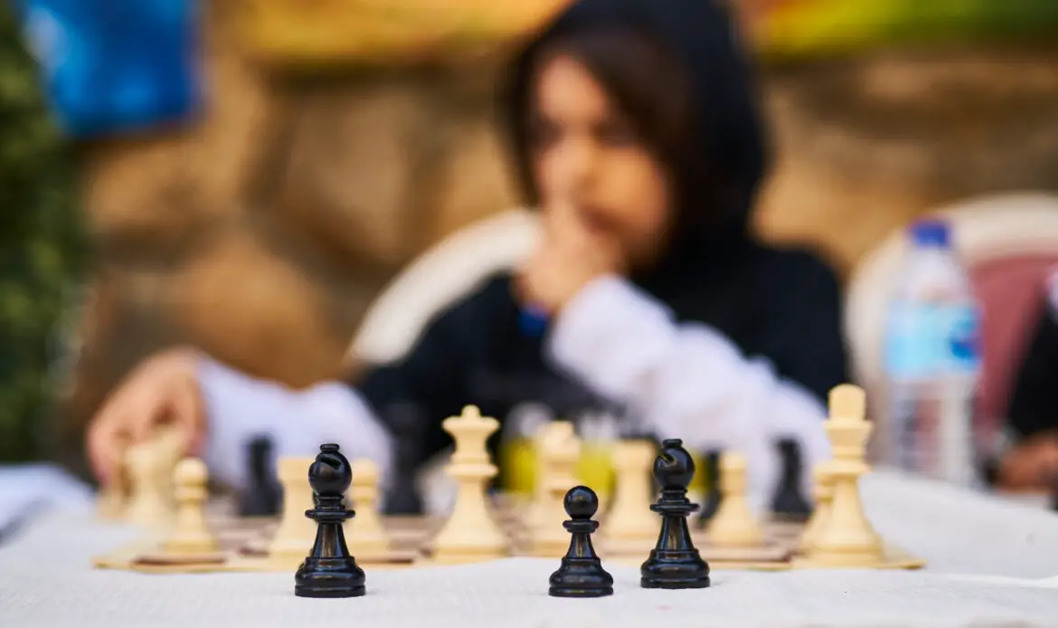 Selective focus photography of chess board set