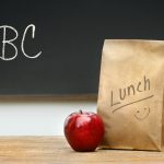 Paper lunch bag on desk