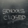 Schools Closed handwritten on Blackboard as JPG File