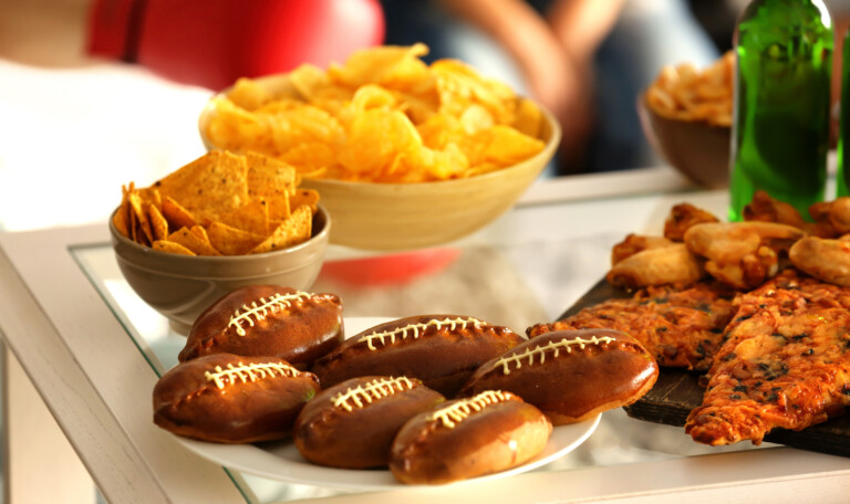 Close up view of tasty snacks and beer