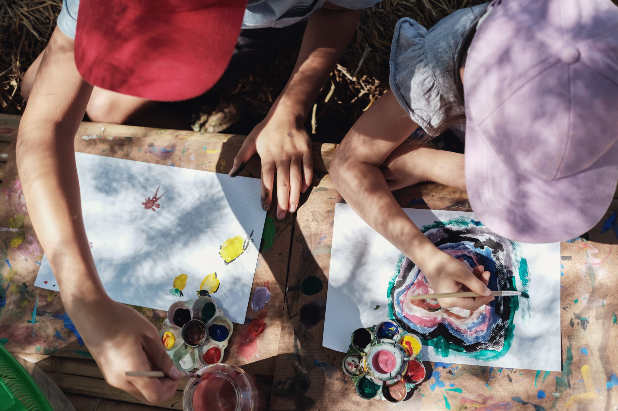 Kids painting art outdoor , montessori homeschooling education concept