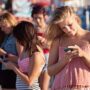 Serious Teenagers on Smartphones
