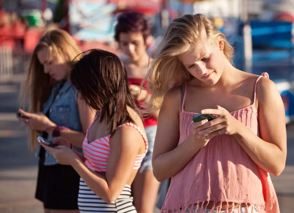 Serious Teenagers on Smartphones