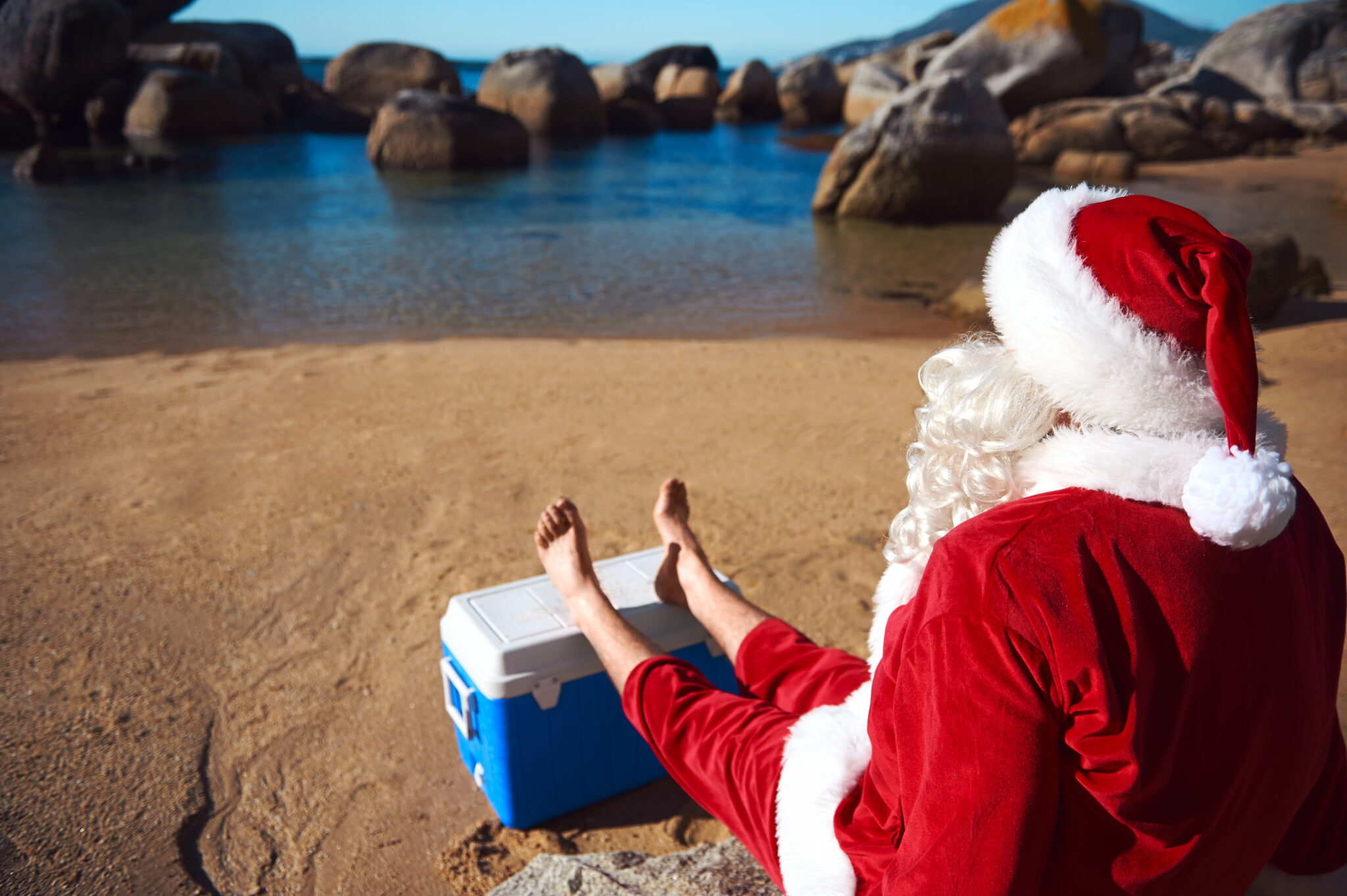 Father Christmas relaxing on the beach