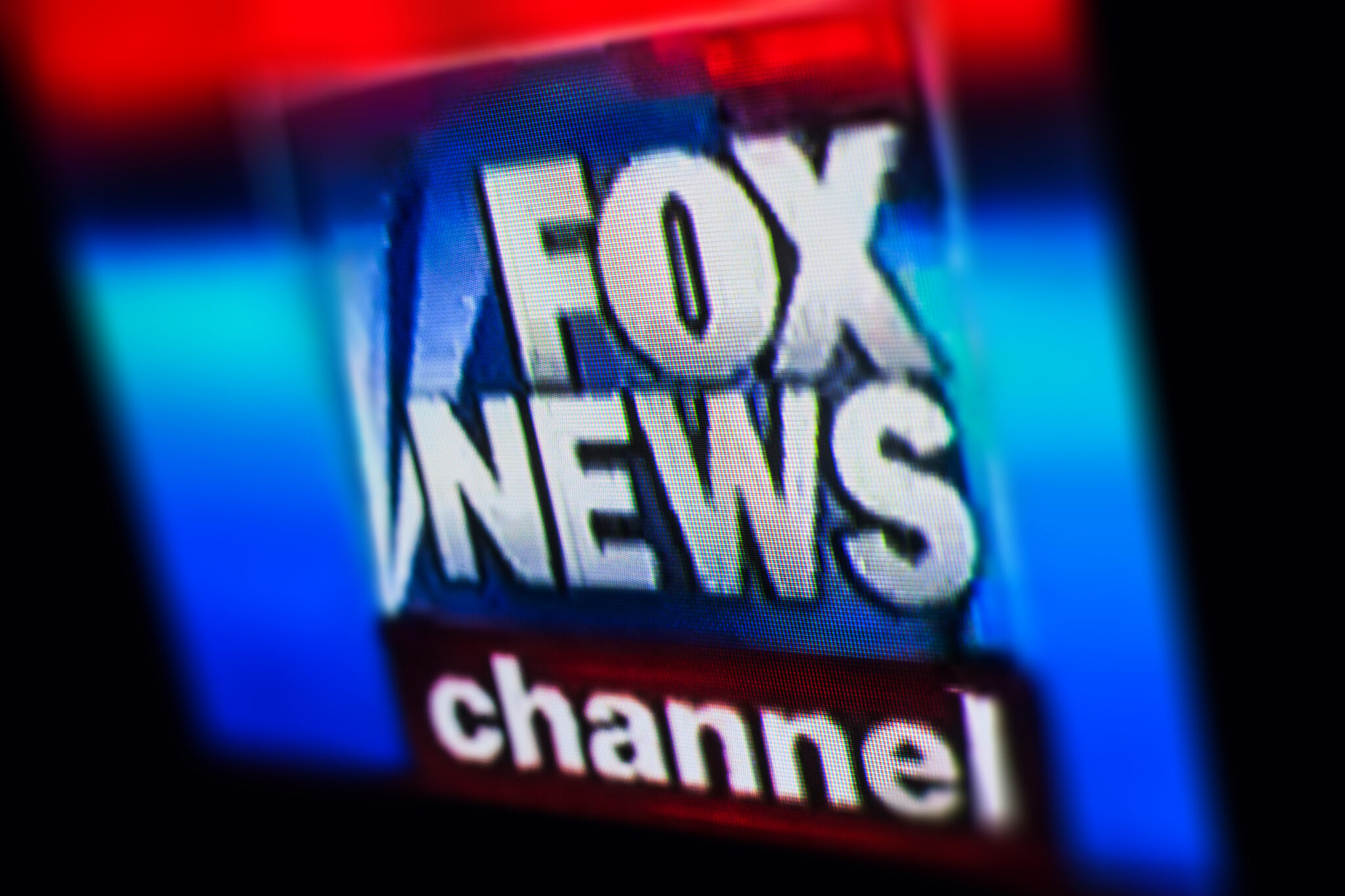 Photo of FOX NEWS chanel logo on a tv monitor screen