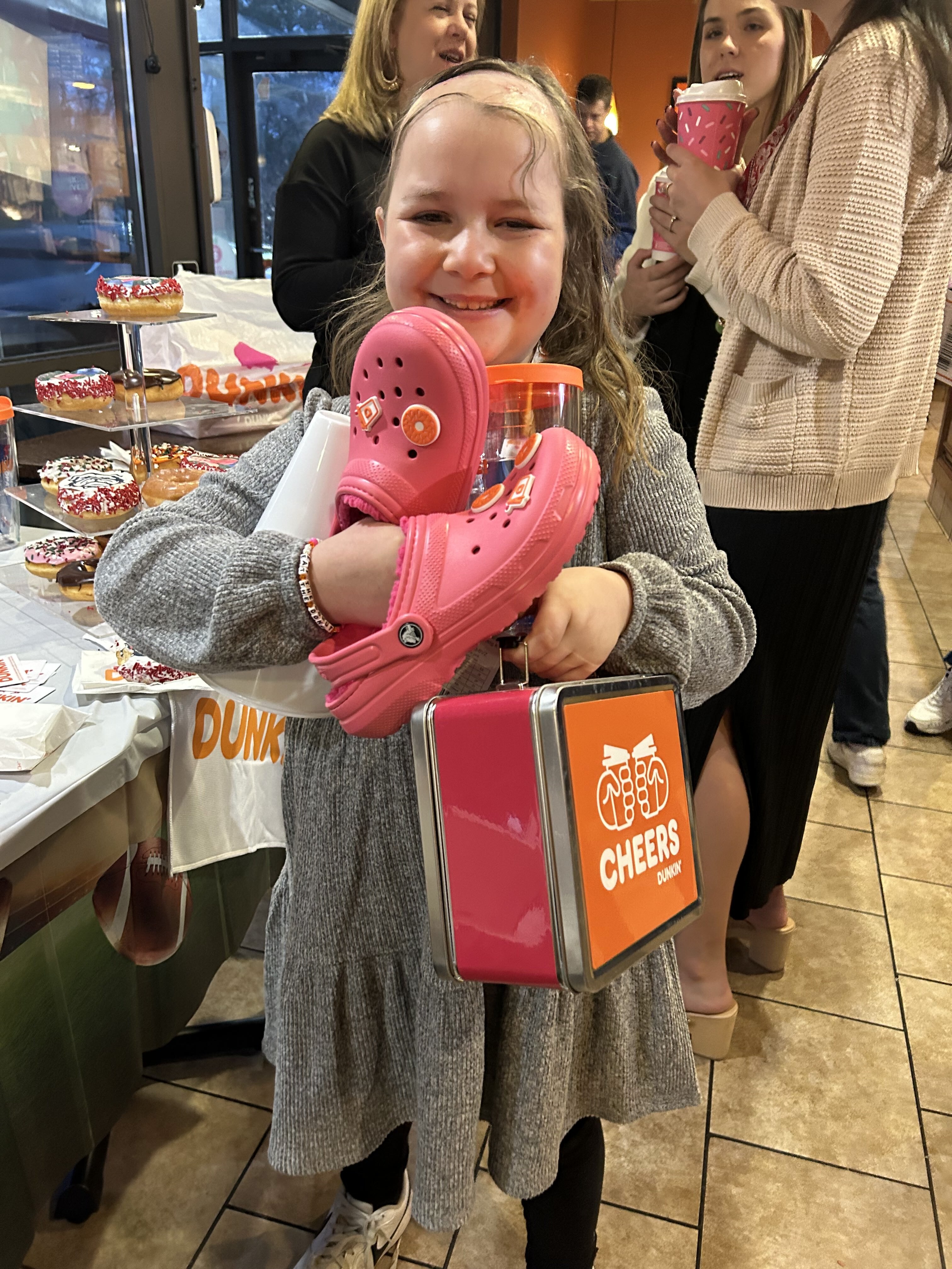 From Dunkin’ to the SEC Championship: A Special Gift for a Brave Young Fan