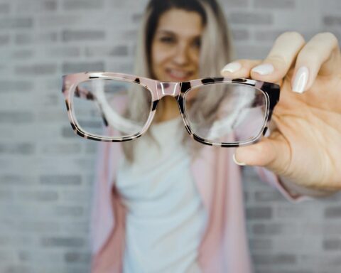 Selective Focus Photography of Pink and Black Framed Eyeglasses