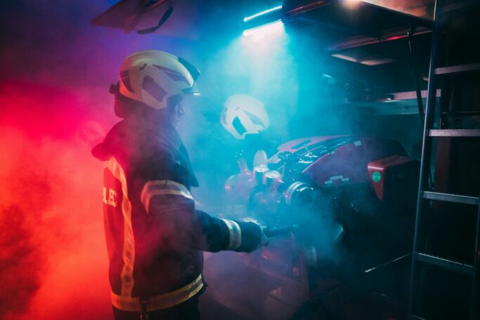 Four Cats Missing After Early Morning House Fire in East Point a man wearing a hard hat and protective gear