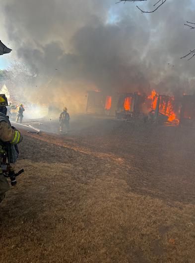 A Christmas Eve fire destroyed one home and damaged two others in Grayson, leaving seven people without a place to stay.