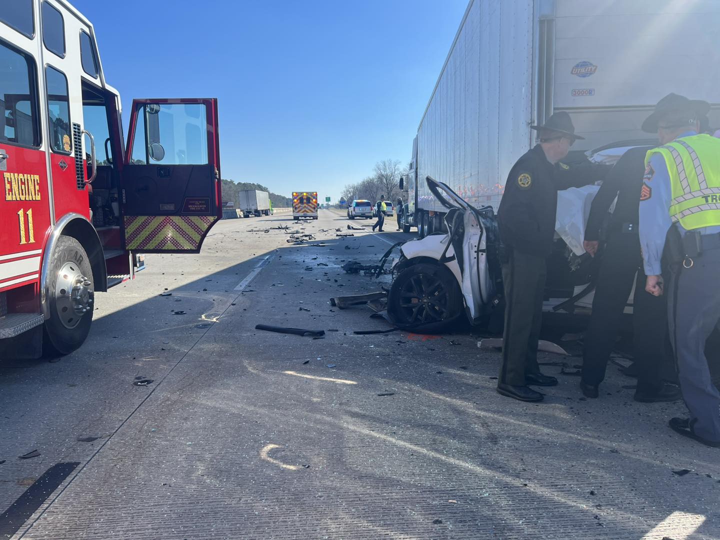 Three people died Thursday when their stolen Range Rover crashed into a tractor-trailer during a police pursuit on I-75 in Crisp County.