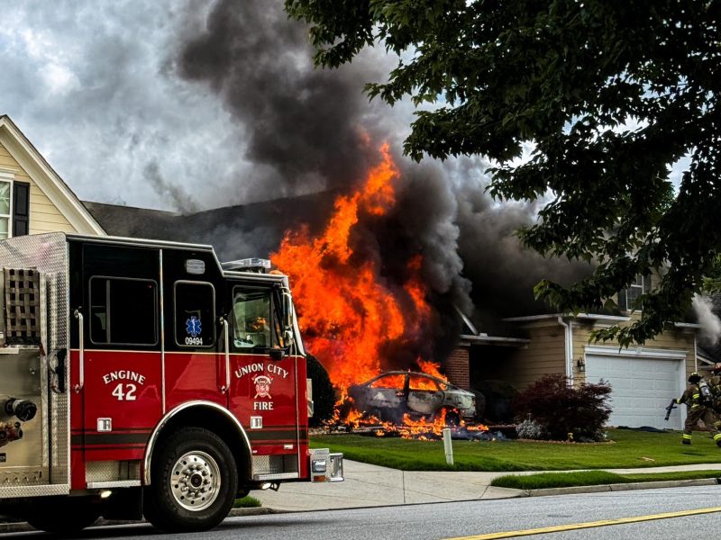 A vehicle slammed into a Union City home today, causing a fire that forced residents to evacuate as emergency crews rushed to the scene.