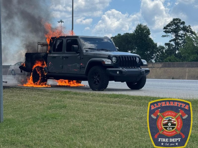 A truck caught fire on the side of Ga. 400 early this afternoon, sending thick smoke into the sky and slowing traffic. No one was hurt, and firefighters put out the flames fast.