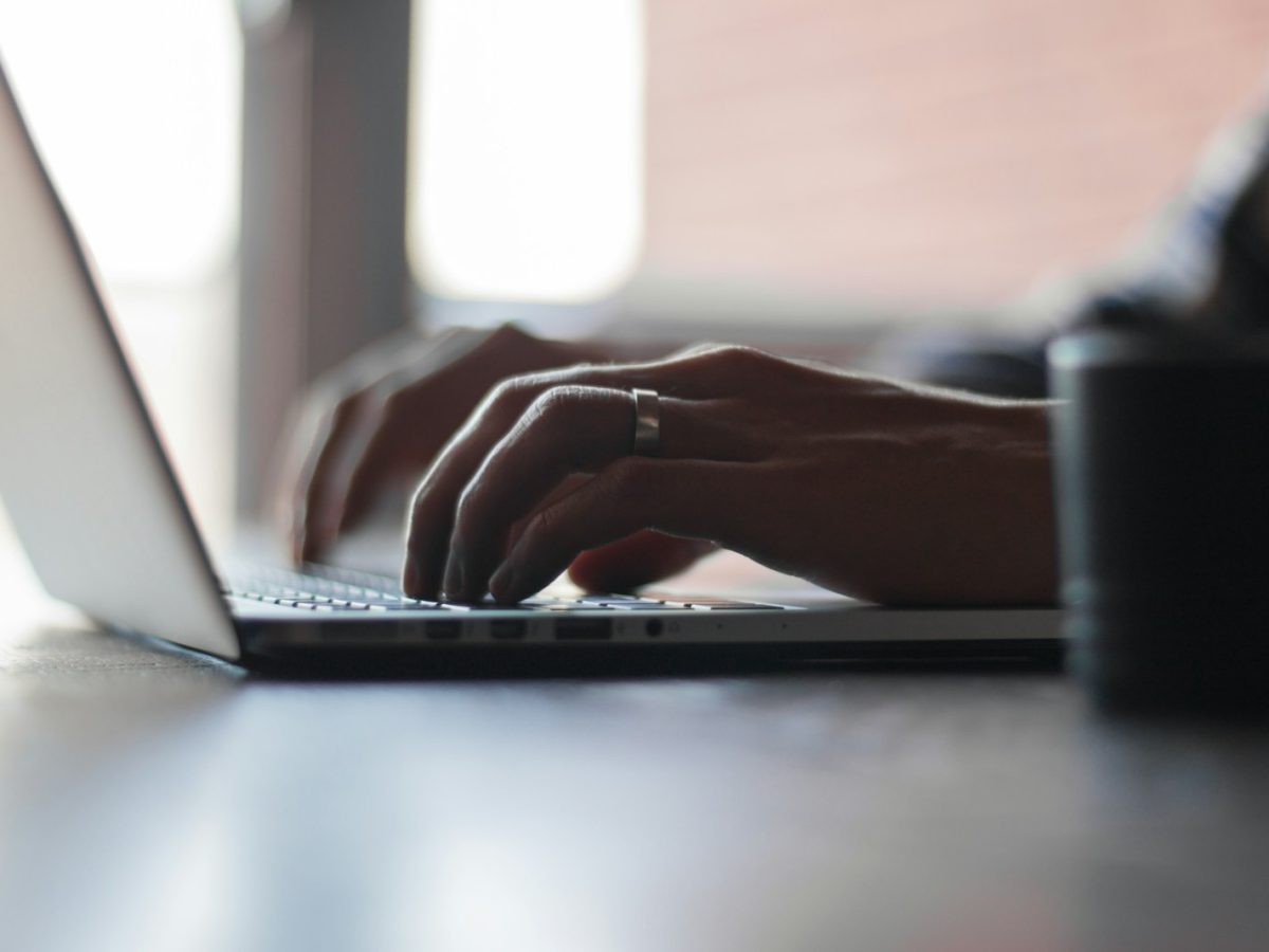 person using laptop