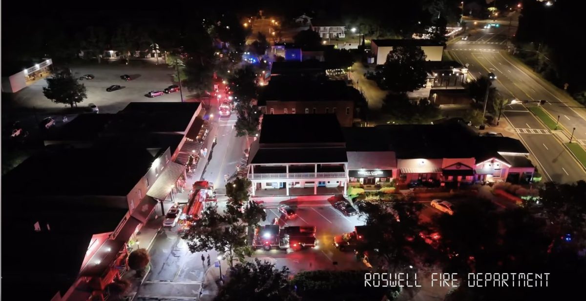 Just after midnight, flames lit up the upper floor of a commercial building near Elizabeth Way and Canton Street. Multiple 911 calls sent Roswell firefighters racing to the scene. They arrived in three minutes to find heavy smoke pouring from the back of the second story.