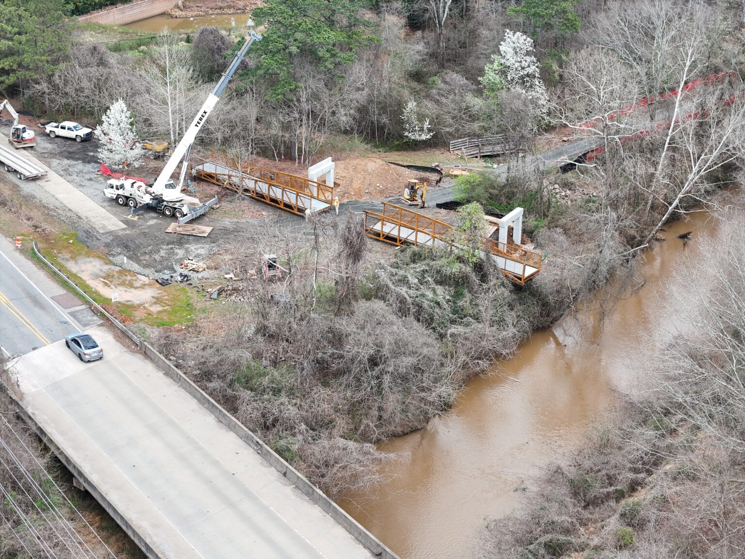 Second bridge delivered to Woodstock's Little River Park