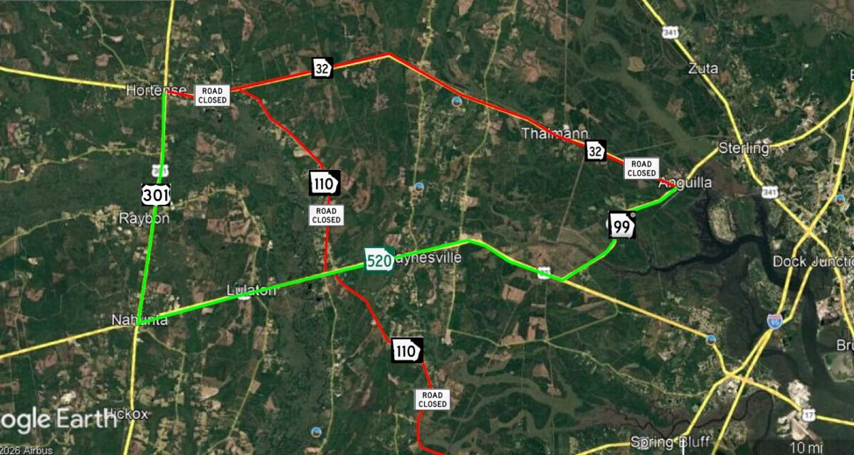 Map showing road closures and open routes around Waynesville, Nahunta, and surrounding areas. Closed roads are marked in red with "ROAD CLOSED" signs on highways 32 and 110. Open routes are marked in green on highways 301, 520, and 99. Nearby towns include Hortense, Raybon, Lulaton, Thalmann, Anguilla, Sterling, Zuta, and Spring Bluff. Major highways visible include 301, 32, 110, 520, 99, 341, and I-95.