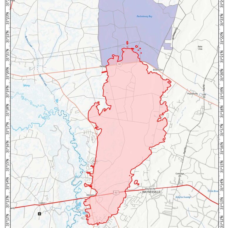 Map showing the wildfire perimeter outlined in red and shaded in light red near Waynesville, Georgia, along Highway 82. The wildfire area covers 20,933 acres as of April 26, 2026. Nearby features include Penholoway Bay to the north, Barber Creek to the west, and various roads such as Atkinson, Post Road, and Mt Pleasant Road. The map includes a scale in miles and a compass rose indicating north.