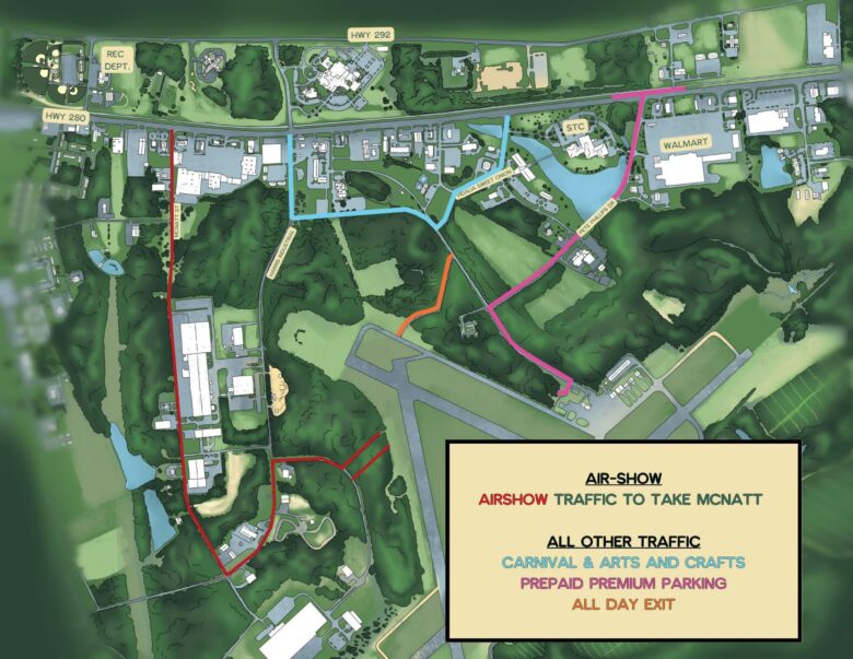 Map showing traffic routes for an airshow and other events. Airshow traffic is directed to take McNatt Street, marked in red. Other traffic for carnival, arts and crafts, prepaid premium parking, and all-day exit is directed along routes marked in blue, pink, and orange. Key landmarks include Walmart, STC, Rec Dept., and highways 280 and 292. Roads are color-coded to indicate different traffic flows. The map includes green areas representing forests and open spaces, with buildings and parking lots in light blue and white.