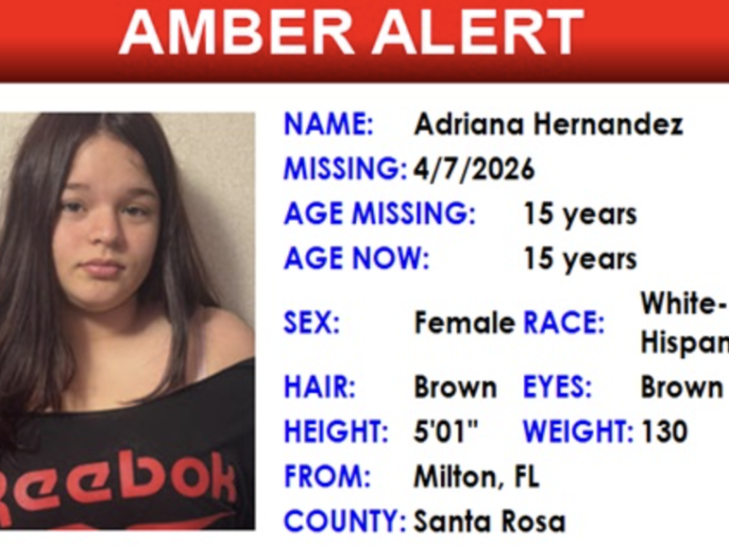 Adriana Hernandez, a 15-year-old female, White-Hispanic, with brown hair and brown eyes, 5'01" tall, weighing 130 pounds, last seen missing on 4/7/2026 from Milton, FL, Santa Rosa County. She is wearing a black Reebok shirt in the photo.