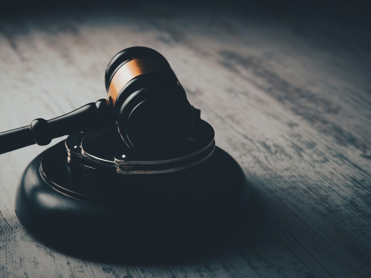 a judge's gaven on a wooden table