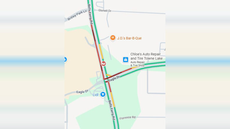 Map showing the intersection of Bells Ferry Rd and Eagle Dr with heavy traffic indicated in red on both roads. Nearby locations include J.D.'s Bar-B-Que to the northeast, Chloe's Auto Repair and Tire Towne Lake to the east, and a Lidl store to the southwest. Surrounding streets include Glenell Dr, Brittley Park Ln, and Florence Rd.
