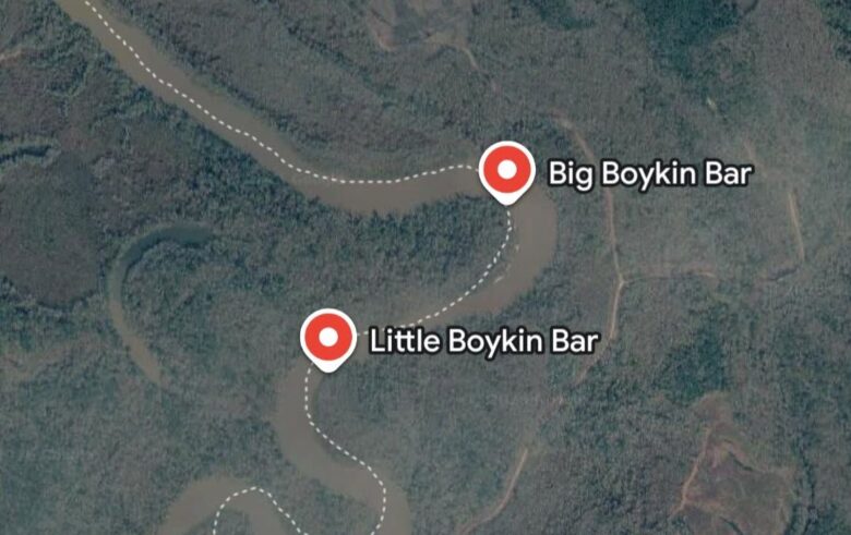 A satellite map showing a winding river labeled with two points: "Big Boykin Bar" near the top right bend and "Little Boykin Bar" near the middle bend. The surrounding area is densely forested. The river is marked with a dashed line along its course.