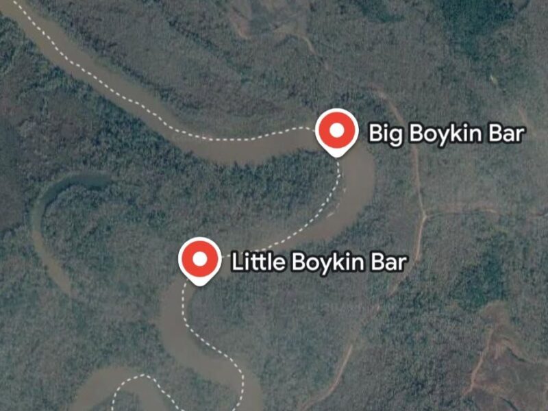 A satellite map showing a winding river labeled with two points: "Big Boykin Bar" near the top right bend and "Little Boykin Bar" near the middle bend. The surrounding area is densely forested. The river is marked with a dashed line along its course.